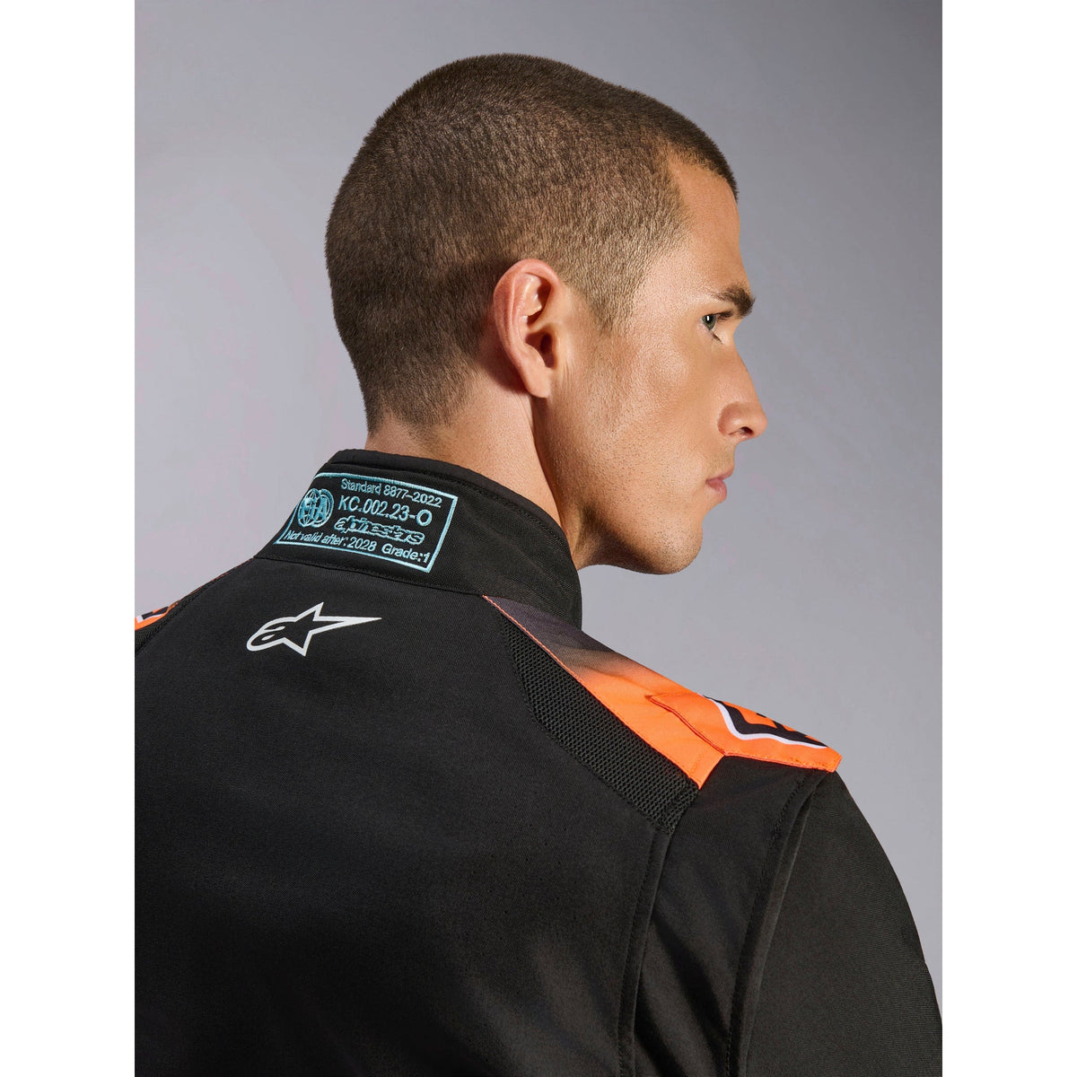 Traje de Karting Alpinestars KMX-5 V3 FIA 8877-2022 Negro/Blanco/Naranja Flúo, detalle