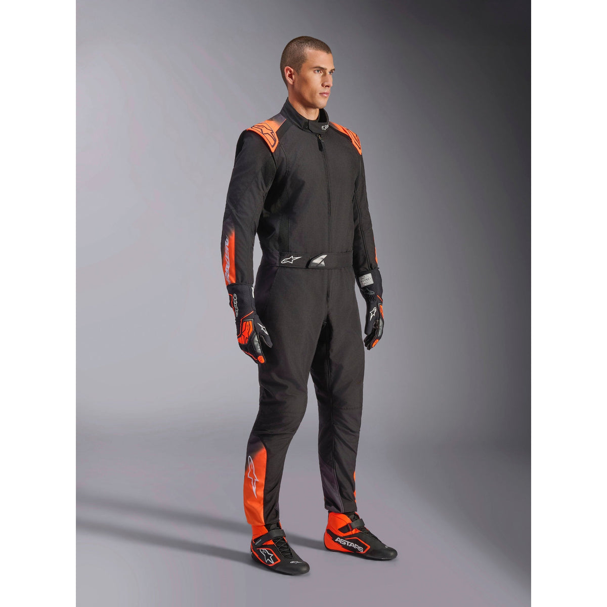 Traje de Karting Alpinestars KMX-5 V3 FIA 8877-2022 Negro/Blanco/Naranja Flúo, vista lateral delantera