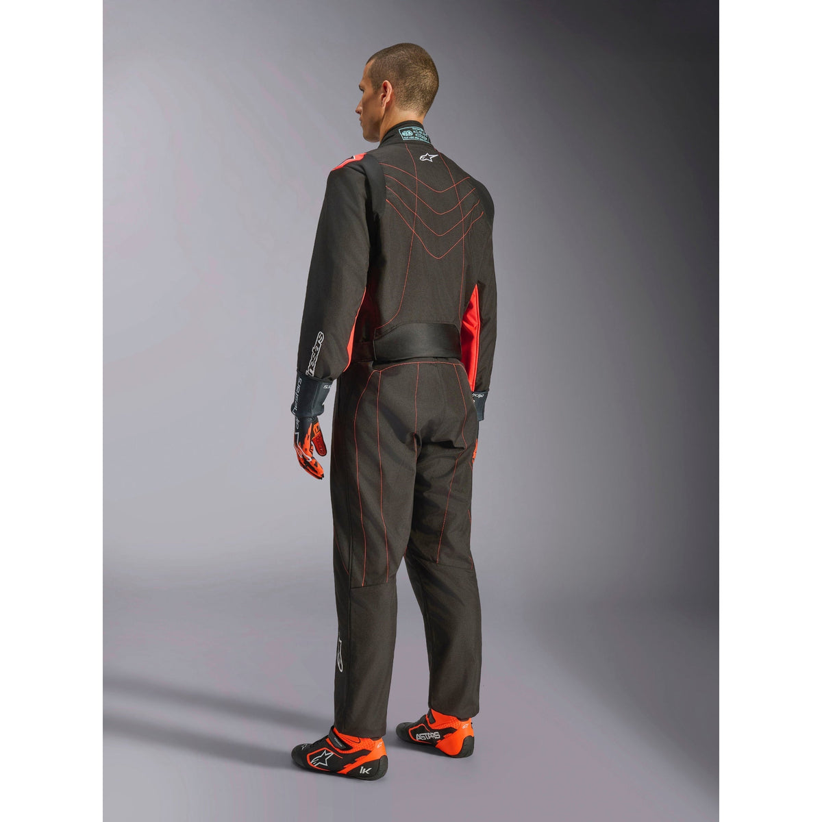 Traje de Karting Alpinestars KMX-9 V3 FIA 8877-2022 Negro/Rojo Flúo, vista lateral trasera