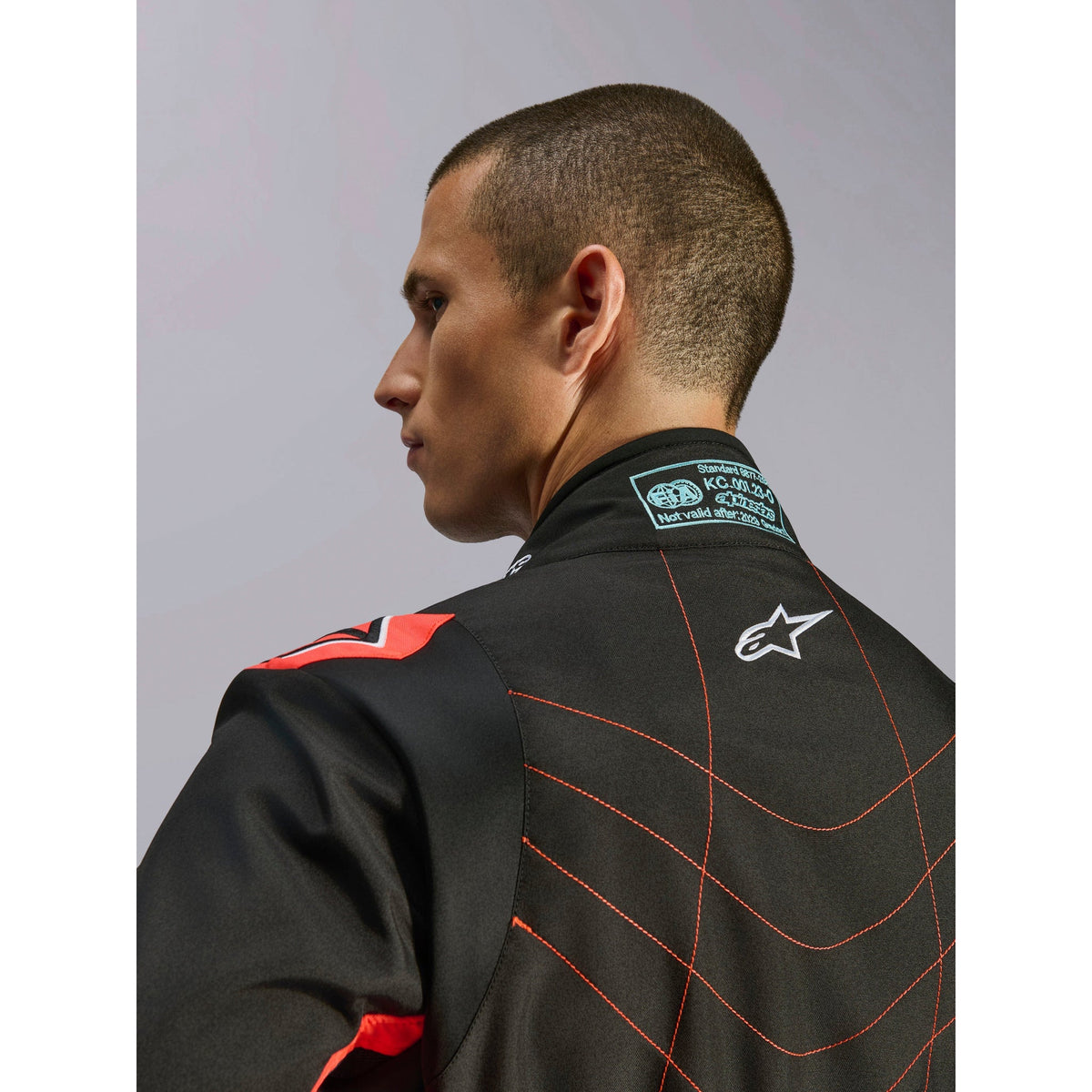 Traje de Karting Alpinestars KMX-9 V3 FIA 8877-2022 Negro/Rojo Flúo, detalle