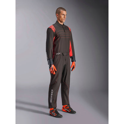 Traje de Karting Alpinestars KMX-9 V3 FIA 8877-2022 Negro/Rojo Flúo, vista lateral delantera
