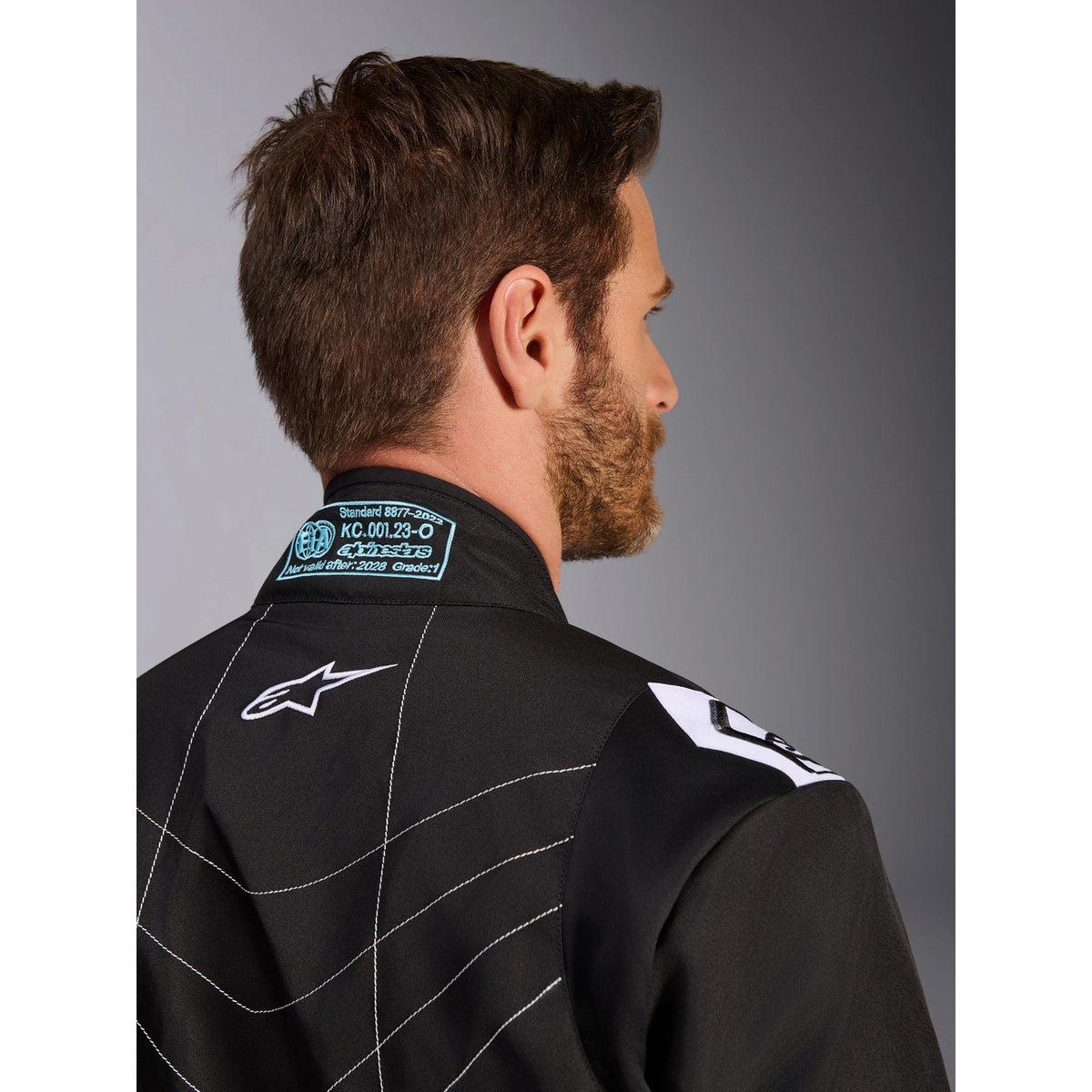 Traje de Karting Alpinestars KMX-9 V3 FIA 8877-2022 Negro/Blanco, detalle