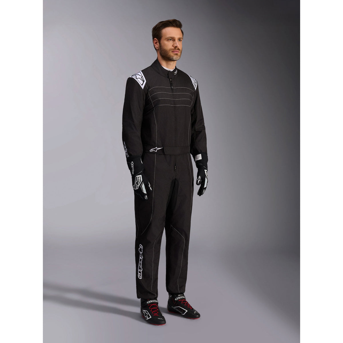 Traje de Karting Alpinestars KMX-9 V3 FIA 8877-2022 Negro/Blanco, vista lateral delantera